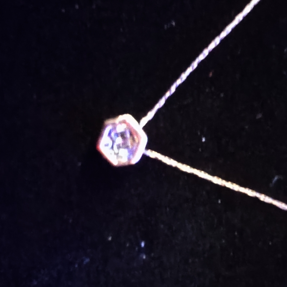 24 carrot gold necklace with a real diamond necklace